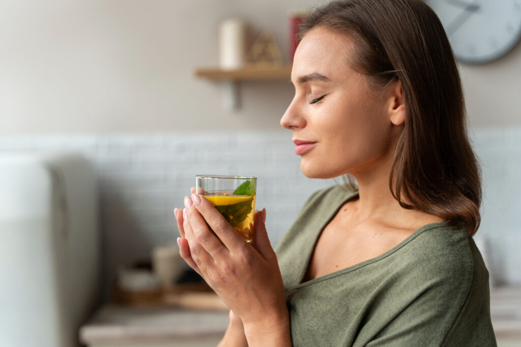 Woman drinking Green tea